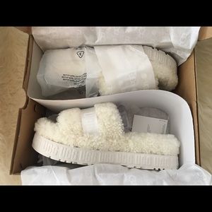 UGG fluffy slides. White. New. Size 10.
